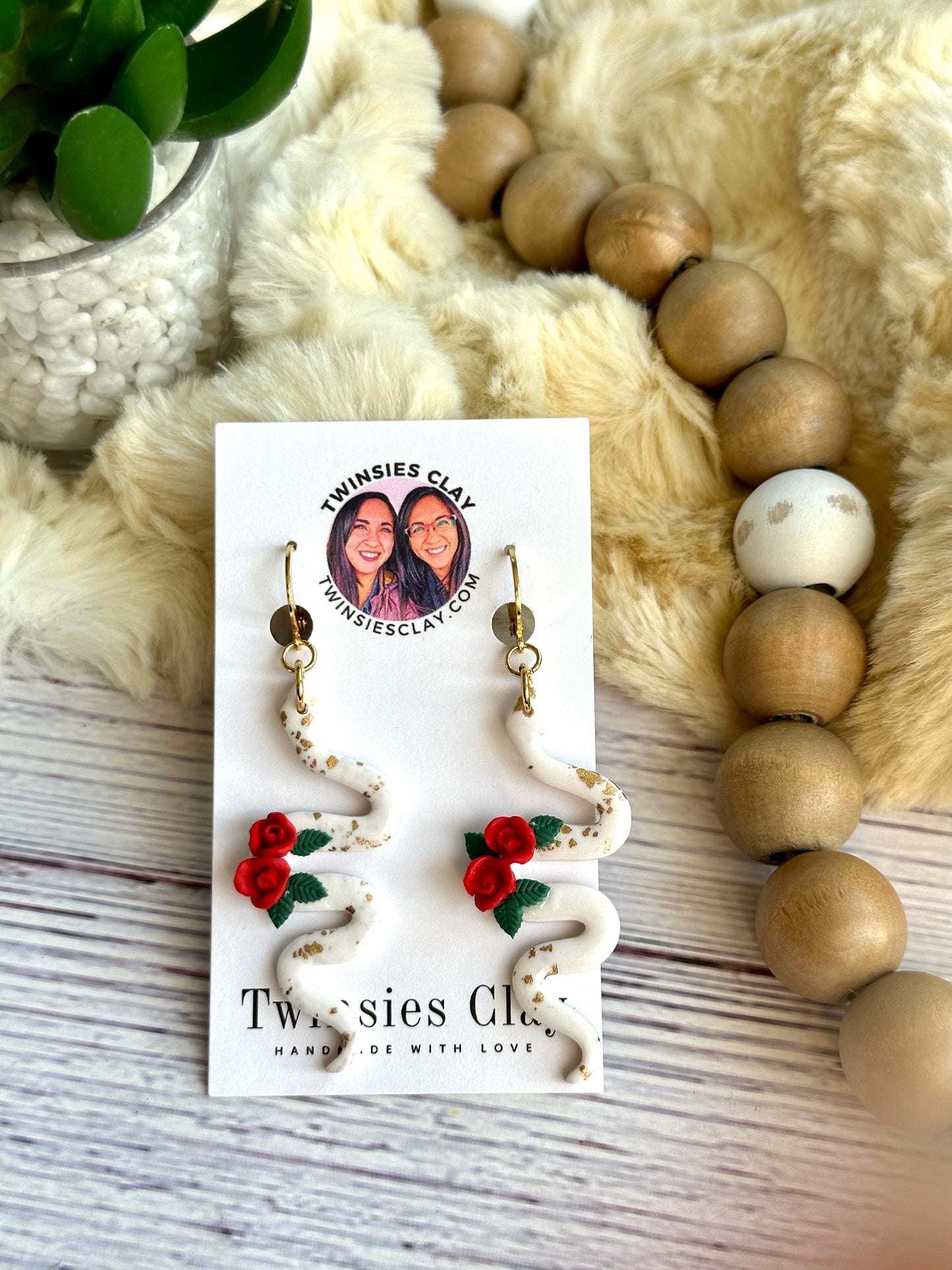 White Snakes with Red Floral